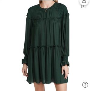 Anthropologie dark green long sleeve tiered mini dress.